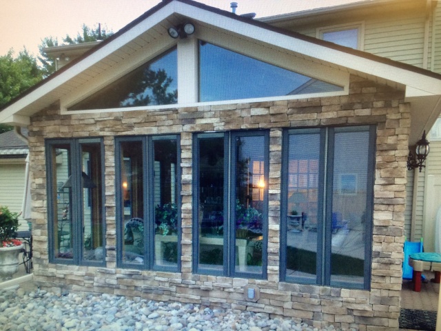 ADDITION SUNROOM WITH STONE